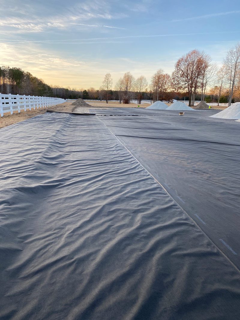 Barhamsville Riding Arena, separation fabric on the dirt subgrade